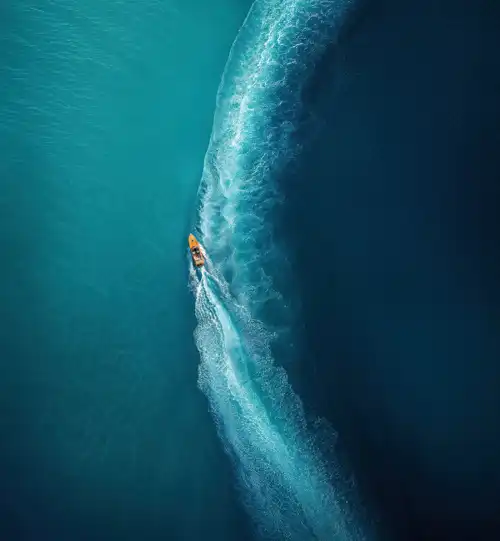 Vivo X Fold 6 Stock Wallpaper 13 - Ocean Speedboat Aerial View