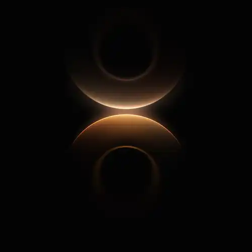 Huawei Mate 80 wallpaper with orange and gold circular light design