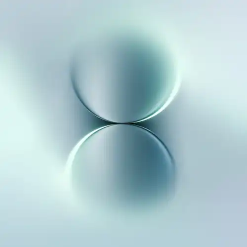 Huawei Mate 80 wallpaper with soft blue abstract spherical shapes